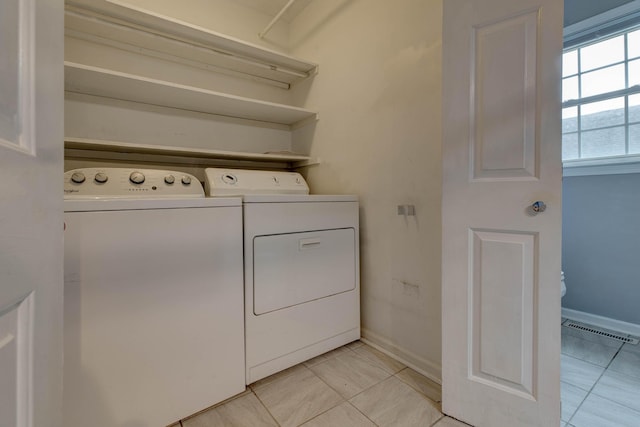 230 Fairway Dr, Nicholasville, KY 40356 - laundry area featuring washer and dryer and light tile patterned floors