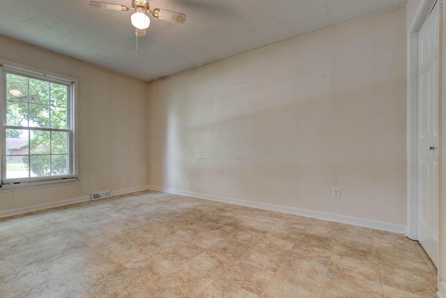 230 Fairway Dr, Nicholasville, KY 40356 - spare room with a textured ceiling and ceiling fan