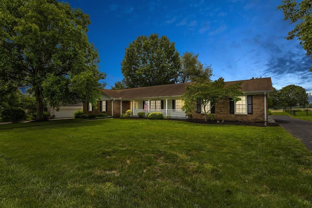 230 Fairway Dr, Nicholasville, KY 40356 - ranch-style house featuring covered porch, a front lawn, and brick siding