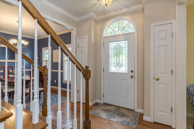 768 Emmett Creek Ln, Lexington, KY 40515 - entryway with stairway, wood finished floors, ornamental molding, and a chandelier