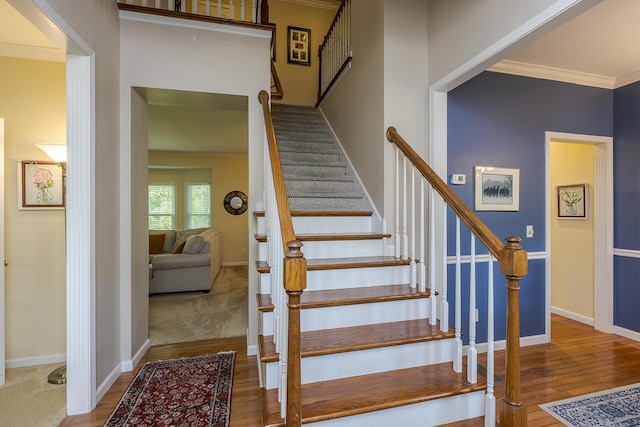 768 Emmett Creek Ln, Lexington, KY 40515 - staircase with crown molding and wood finished floors