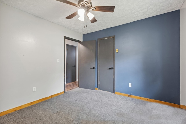 15 Conlee Ln, Stanton, KY 40380 - empty room featuring a textured ceiling, ceiling fan, baseboards, and carpet