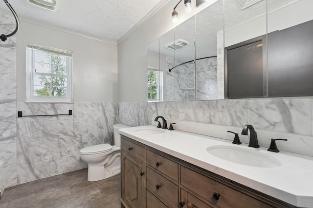 15 Conlee Ln, Stanton, KY 40380 - full bath featuring tile walls, crown molding, double vanity, toilet, and a shower