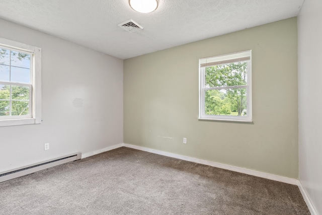 15 Conlee Ln, Stanton, KY 40380 - carpeted spare room with baseboard heating, healthy amount of natural light, a textured ceiling, and baseboards