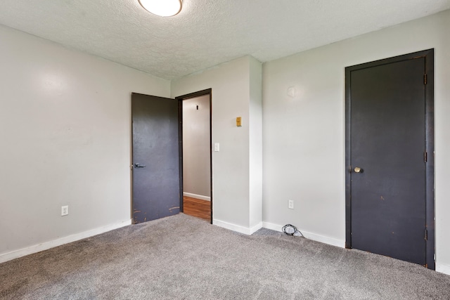15 Conlee Ln, Stanton, KY 40380 - unfurnished bedroom featuring carpet, a textured ceiling, and baseboards