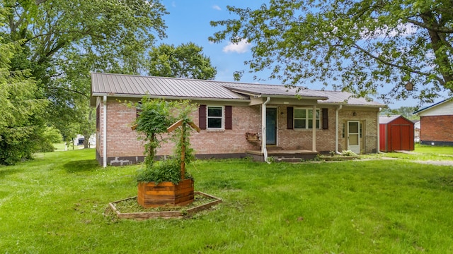 15 Conlee Ln, Stanton, KY 40380 - ranch-style home with a front lawn, metal roof, and brick siding