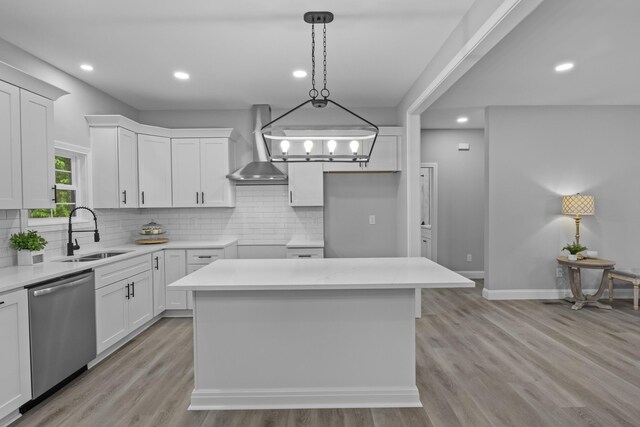 437 Boones Creek Rd, Lancaster, KY 40444 - kitchen with a sink, stainless steel dishwasher, wall chimney exhaust hood, a center island, and light wood finished floors