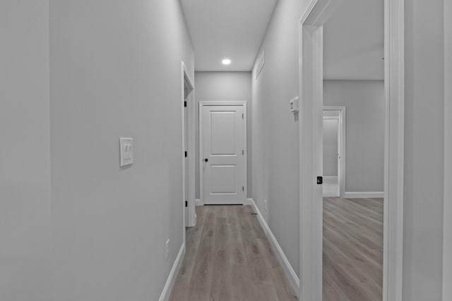 437 Boones Creek Rd, Lancaster, KY 40444 - corridor with light wood finished floors, baseboards, and recessed lighting
