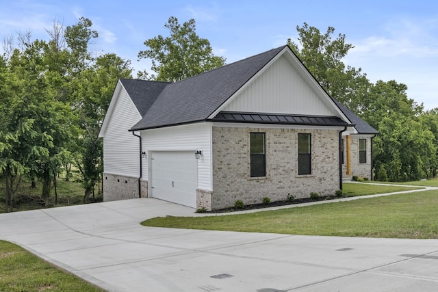 437 Boones Creek Rd, Lancaster, KY 40444 - view of property exterior featuring brick siding, a yard, concrete driveway, a standing seam roof, and an attached garage