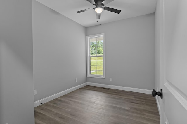437 Boones Creek Rd, Lancaster, KY 40444 - spare room featuring baseboards, ceiling fan, and wood finished floors