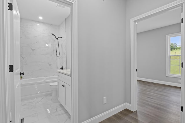 437 Boones Creek Rd, Lancaster, KY 40444 - bathroom with vanity, baseboards, shower / washtub combination, and toilet
