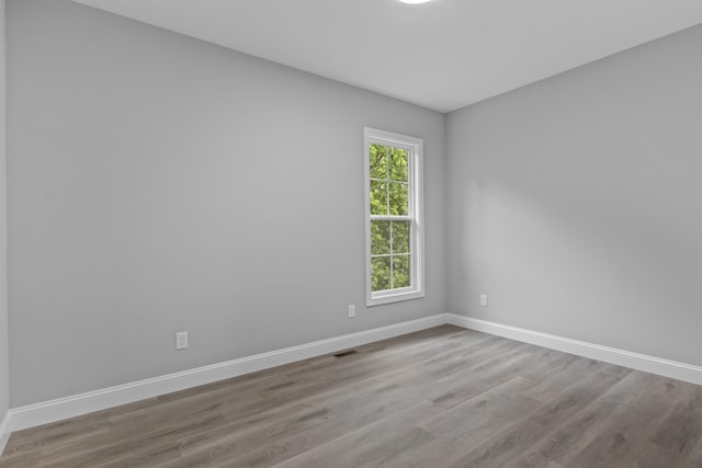 437 Boones Creek Rd, Lancaster, KY 40444 - unfurnished room with baseboards and wood finished floors