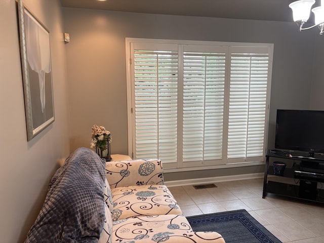 260 Beech Fork Blvd, Clay City, KY 40312 - tiled living room with baseboards and a chandelier