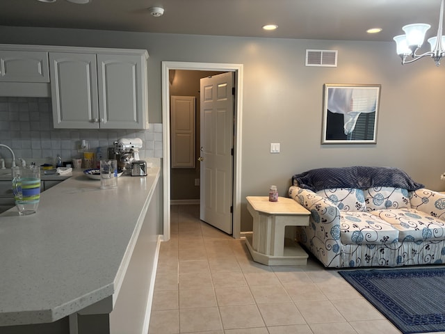 260 Beech Fork Blvd, Clay City, KY 40312 - bedroom with light tile patterned floors, a chandelier, and recessed lighting