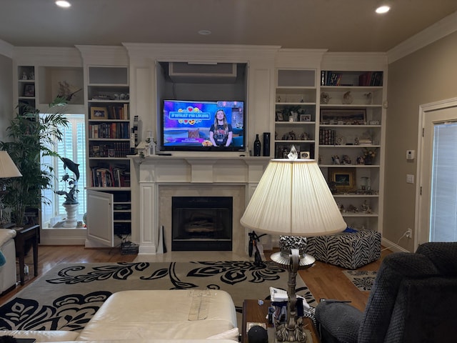 260 Beech Fork Blvd, Clay City, KY 40312 - living room with wood finished floors, crown molding, a fireplace, recessed lighting, and built in shelves