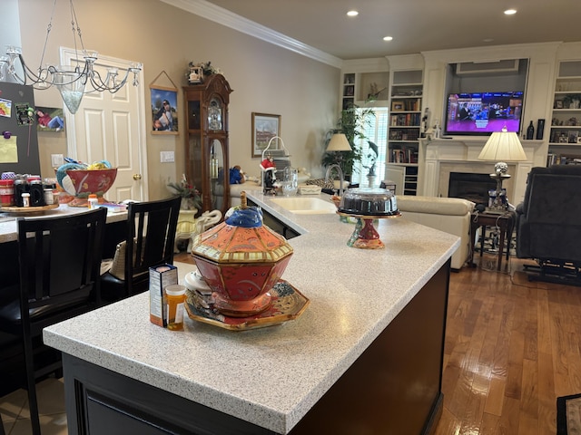 260 Beech Fork Blvd, Clay City, KY 40312 - kitchen with ornamental molding, recessed lighting, light countertops, a kitchen island, and a fireplace