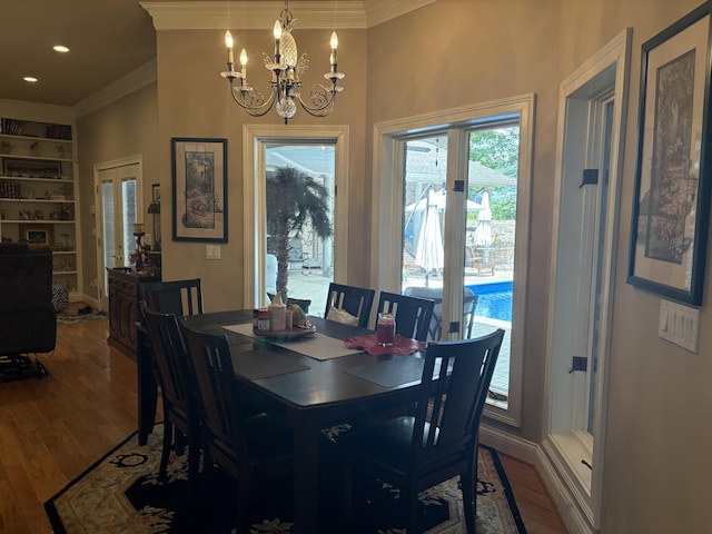 260 Beech Fork Blvd, Clay City, KY 40312 - dining space with crown molding, a chandelier, wood finished floors, built in features, and recessed lighting
