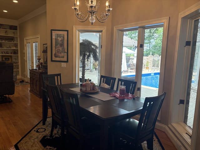 260 Beech Fork Blvd, Clay City, KY 40312 - dining area featuring a chandelier, wood finished floors, ornamental molding, and built in features