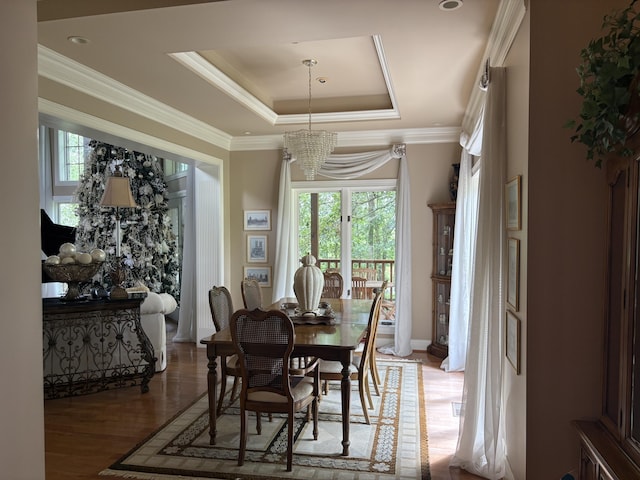 260 Beech Fork Blvd, Clay City, KY 40312 - dining room with a chandelier, healthy amount of natural light, a raised ceiling, wood finished floors, and crown molding