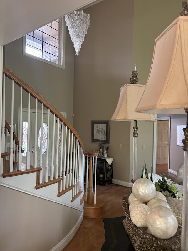 260 Beech Fork Blvd, Clay City, KY 40312 - entryway featuring stairs, wood finished floors, and a towering ceiling