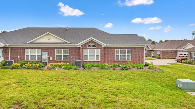 111 Acorn Path, Georgetown, KY 40324 - view of front of home featuring brick siding, a front yard, and roof with shingles
