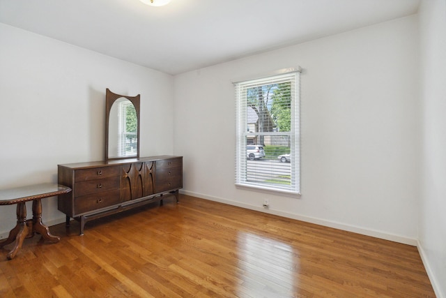 3852 Heimbaugh Ln, Lexington, KY 40514 - empty room with wood finished floors and baseboards