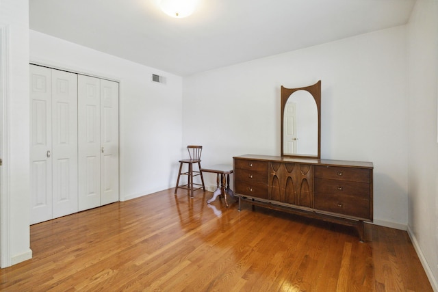 3852 Heimbaugh Ln, Lexington, KY 40514 - bedroom with wood finished floors and a closet