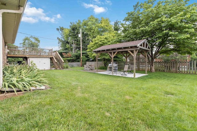 3852 Heimbaugh Ln, Lexington, KY 40514 - fenced backyard featuring a gazebo, stairway, a deck, and a patio