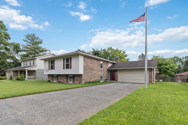 3852 Heimbaugh Ln, Lexington, KY 40514 - tri-level home with driveway, a garage, brick siding, and a chimney
