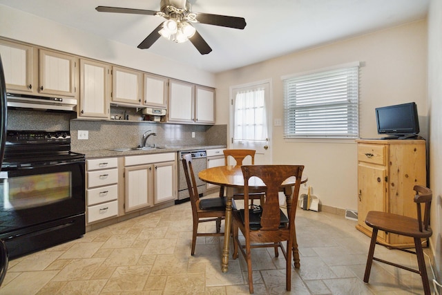 3852 Heimbaugh Ln, Lexington, KY 40514 - kitchen with dishwashing machine, black electric range, under cabinet range hood, backsplash, and stone tile floors