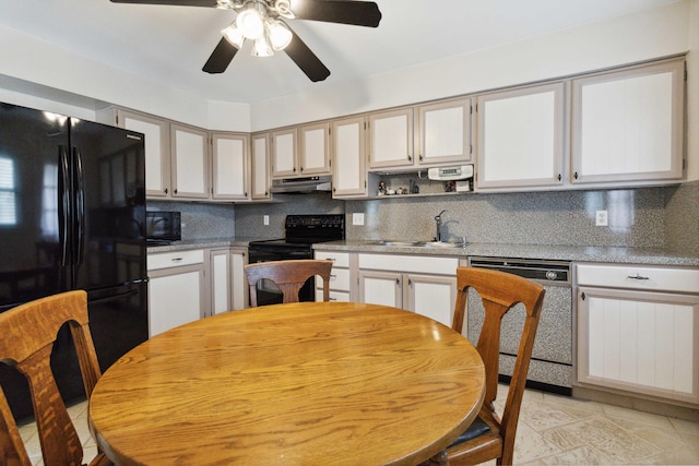 3852 Heimbaugh Ln, Lexington, KY 40514 - kitchen with black appliances, decorative backsplash, and under cabinet range hood