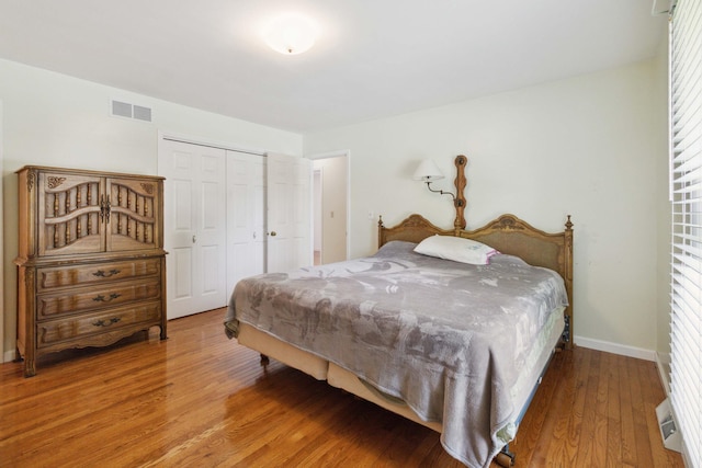 3852 Heimbaugh Ln, Lexington, KY 40514 - bedroom featuring wood finished floors and a closet