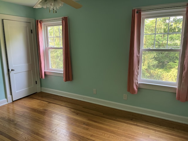 1134 Liberty Rd, Lexington, KY 40505 - unfurnished bedroom featuring hardwood / wood-style floors and baseboards