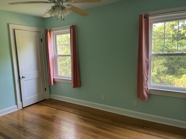 1134 Liberty Rd, Lexington, KY 40505 - unfurnished bedroom featuring hardwood / wood-style flooring and ceiling fan