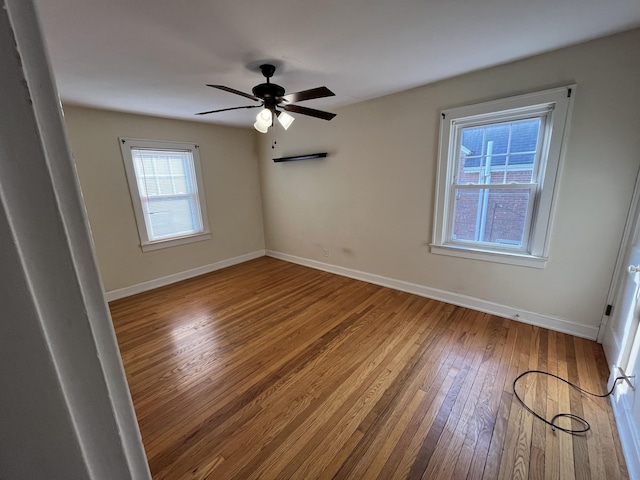 1134 Liberty Rd, Lexington, KY 40505 - unfurnished room featuring hardwood / wood-style flooring and a ceiling fan