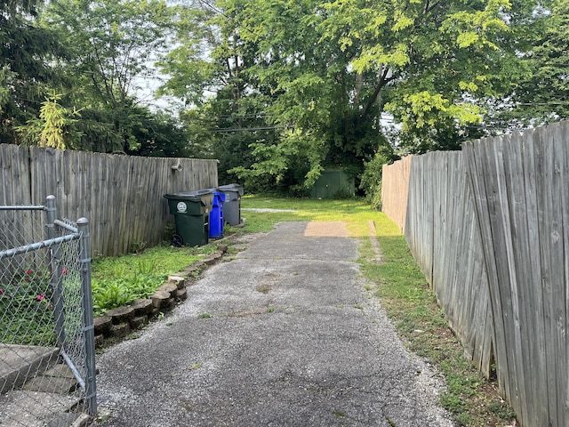1134 Liberty Rd, Lexington, KY 40505 - fenced backyard featuring driveway