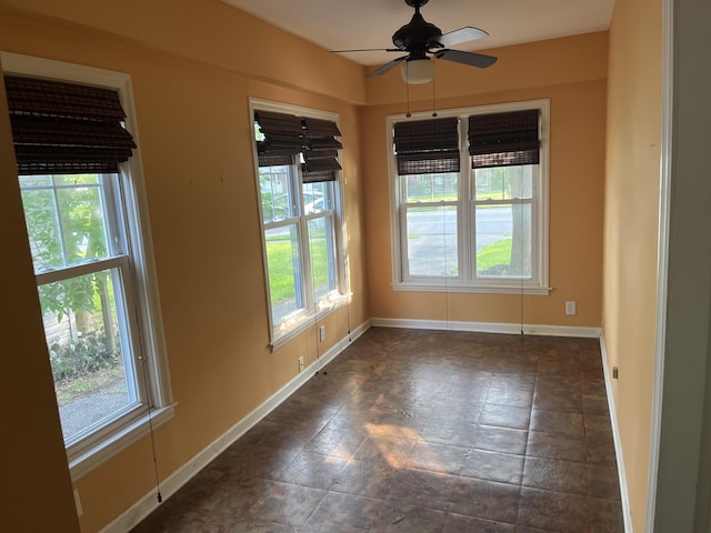1134 Liberty Rd, Lexington, KY 40505 - empty room with healthy amount of natural light and ceiling fan