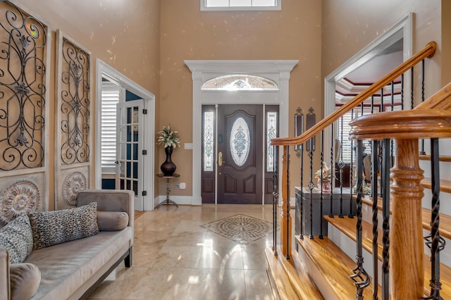 315 Whispering Brook Dr, Nicholasville, KY 40356 - entryway with a towering ceiling, marble tiled floors, and stairs