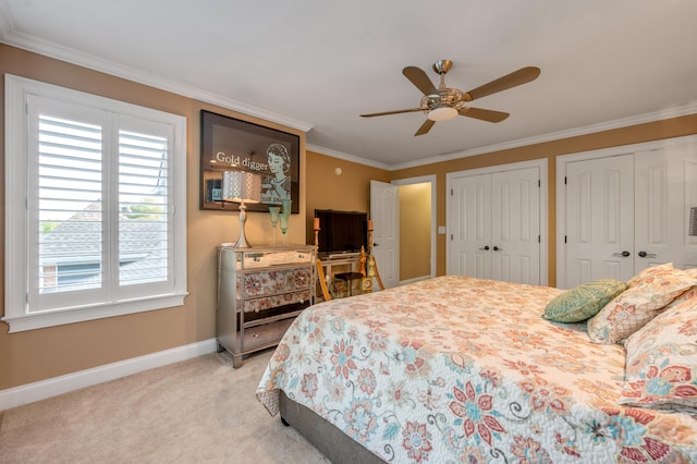 315 Whispering Brook Dr, Nicholasville, KY 40356 - bedroom with crown molding, two closets, light colored carpet, and ceiling fan