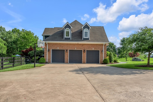 315 Whispering Brook Dr, Nicholasville, KY 40356 - view of property exterior with driveway, brick siding, a shingled roof, and an attached garage