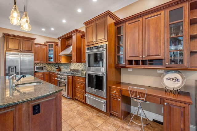 315 Whispering Brook Dr, Nicholasville, KY 40356 - kitchen with a warming drawer, appliances with stainless steel finishes, under cabinet range hood, brown cabinets, and decorative backsplash