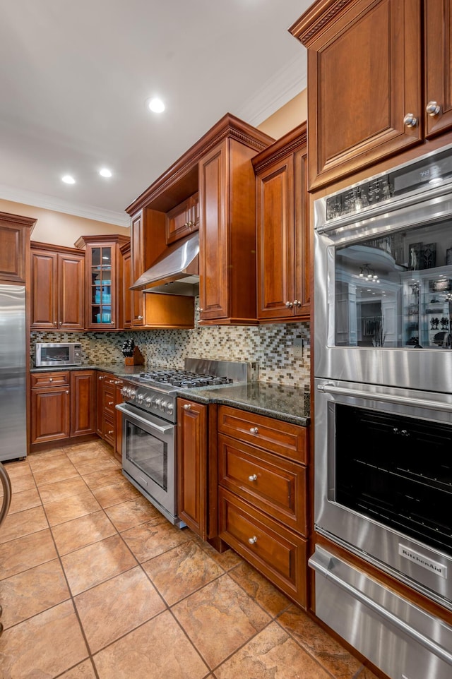 315 Whispering Brook Dr, Nicholasville, KY 40356 - kitchen featuring built in appliances, a warming drawer, ornamental molding, under cabinet range hood, and backsplash