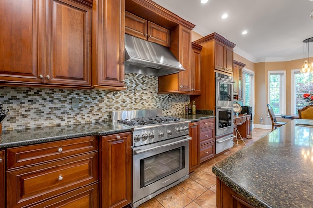 315 Whispering Brook Dr, Nicholasville, KY 40356 - kitchen featuring appliances with stainless steel finishes, under cabinet range hood, a warming drawer, decorative backsplash, and crown molding