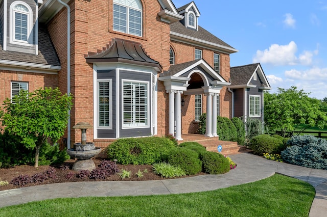 315 Whispering Brook Dr, Nicholasville, KY 40356 - view of front of home featuring brick siding and roof with shingles