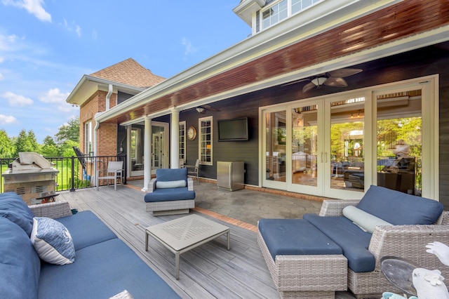 315 Whispering Brook Dr, Nicholasville, KY 40356 - wooden deck featuring an outdoor living space with a fireplace, a ceiling fan, and french doors