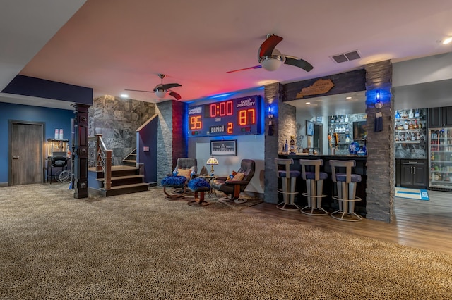 315 Whispering Brook Dr, Nicholasville, KY 40356 - game room with a ceiling fan, bar, and wood finished floors