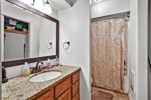 224 E Higgins St, Midway, KY 40347 - full bath featuring vanity, tile patterned flooring, and shower / tub combo with curtain
