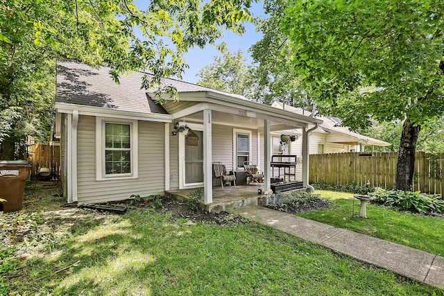 224 E Higgins St, Midway, KY 40347 - view of front of property with a porch and roof with shingles