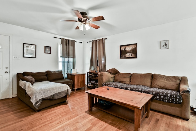 224 E Higgins St, Midway, KY 40347 - living area with a ceiling fan and light wood-type flooring