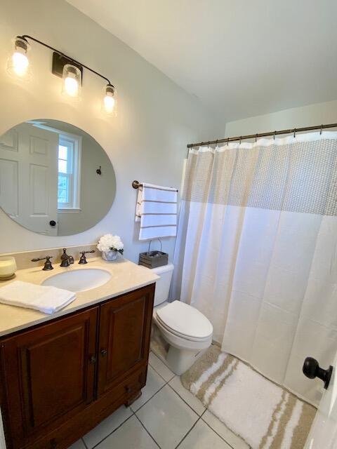 2929 Waco Rd, Lexington, KY 40503 - bathroom featuring vanity, tile patterned flooring, and a shower with curtain